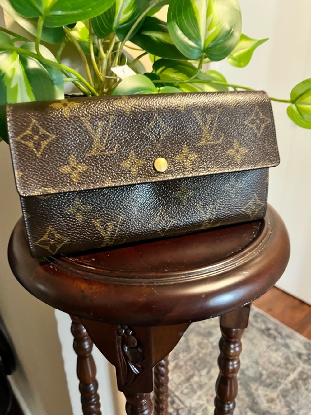 Louis Vuitton Monogram Canvas Sarah Wallet. No callouts, normal signs of use